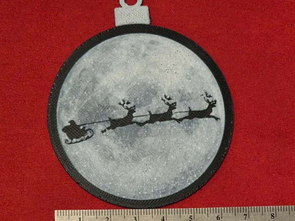 Santa Flying Across Moon Christmas Ornament by AirMechDesigns HueForge model: Santa Flying Across Moon Christmas Ornament by AirMechDesigns