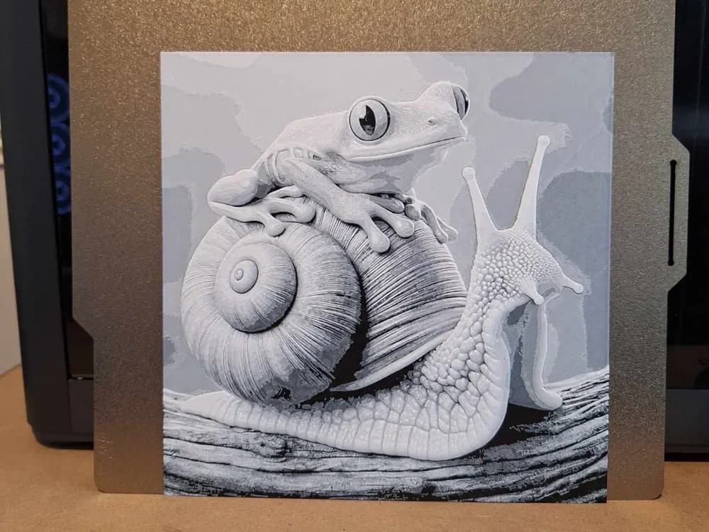The snail and the hitchhiker - 2 colour - hueforge by 3dGlow HueForge model: The snail and the hitchhiker - 2 colour - hueforge by 3dGlow