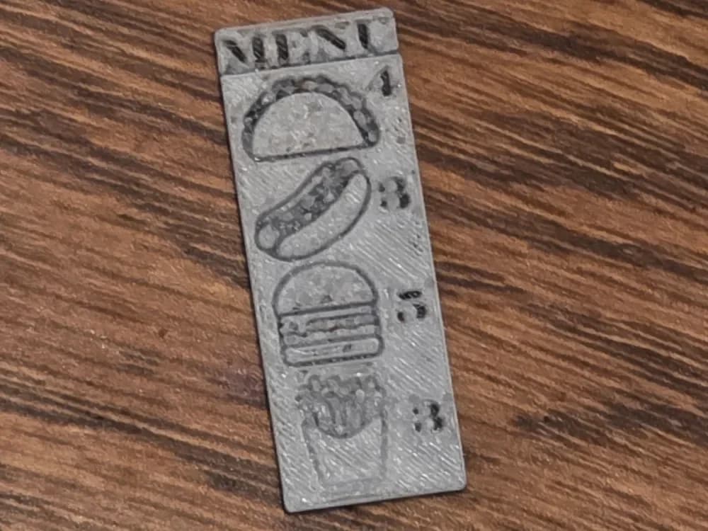 Barbie/doll Resturant Menu 15x40mm Black/white by AirMechDesigns HueForge model: Barbie/doll Resturant Menu 15x40mm Black/white by AirMechDesigns