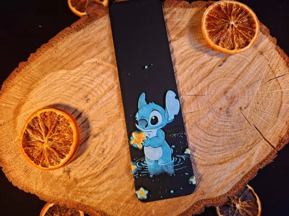 Stich holding star bookmark Stich holding star bookmark