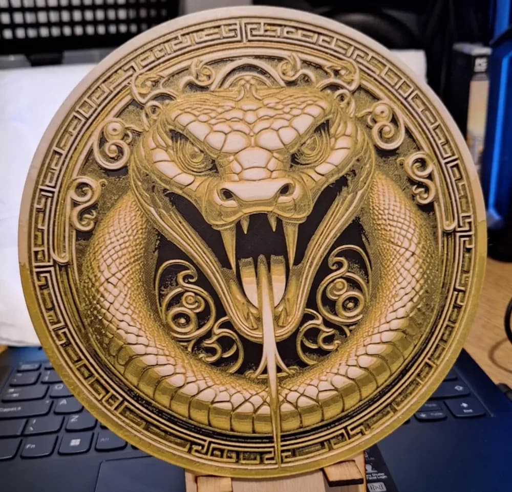 Year of the Snake 2025 v3 - hugeforge golden by 3dGlow HueForge model: Year of the Snake 2025 v3 - hugeforge golden by 3dGlow
