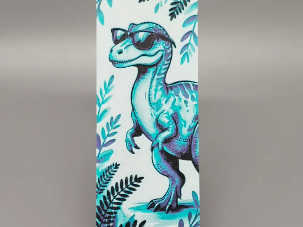 "Bookmark" of a cool Dino wearing sunglasses. by BLUSH Designs HueForge model: "Bookmark" of a cool Dino wearing sunglasses. by BLUSH Designs