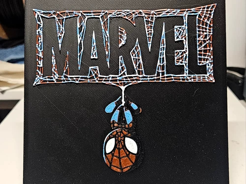 Spiderman hanging down by Mano's 3d_Art HueForge model: Spiderman hanging down by Mano's 3d_Art