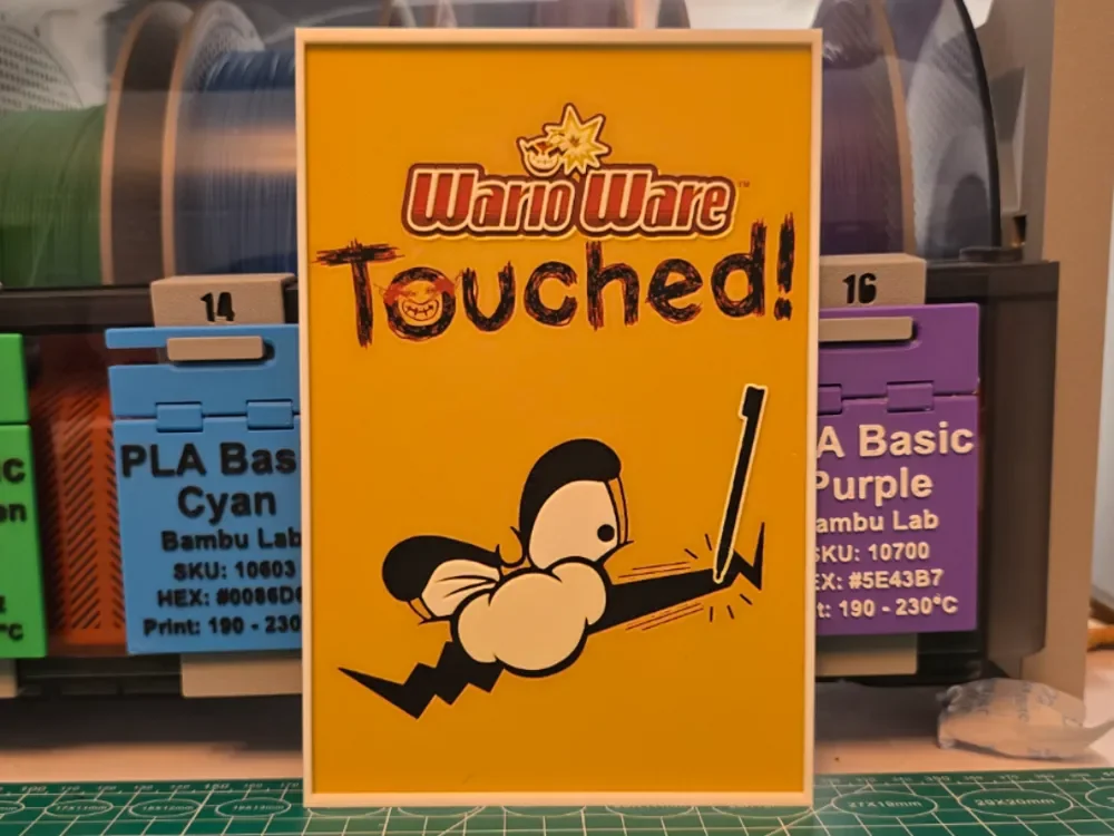 WarioWare: Touched! Game Poster - Hueforge Art by Lumpy3D HueForge model: WarioWare: Touched! Game Poster - Hueforge Art by Lumpy3D