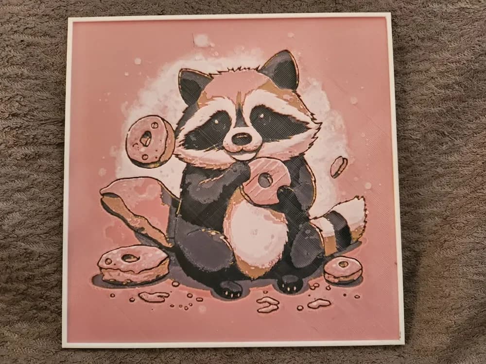 Raccoon with the donuts - HueForge by keko HueForge model: Raccoon with the donuts - HueForge by keko