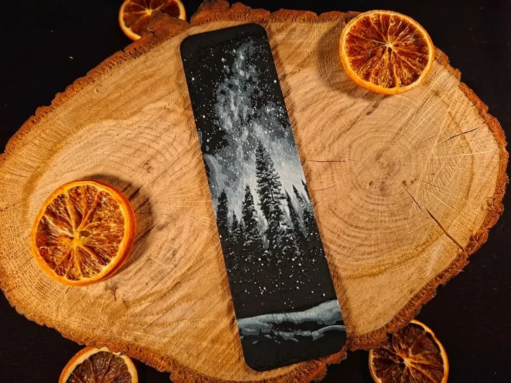 Snowy forest and galaxy bookmark Snowy forest and galaxy bookmark