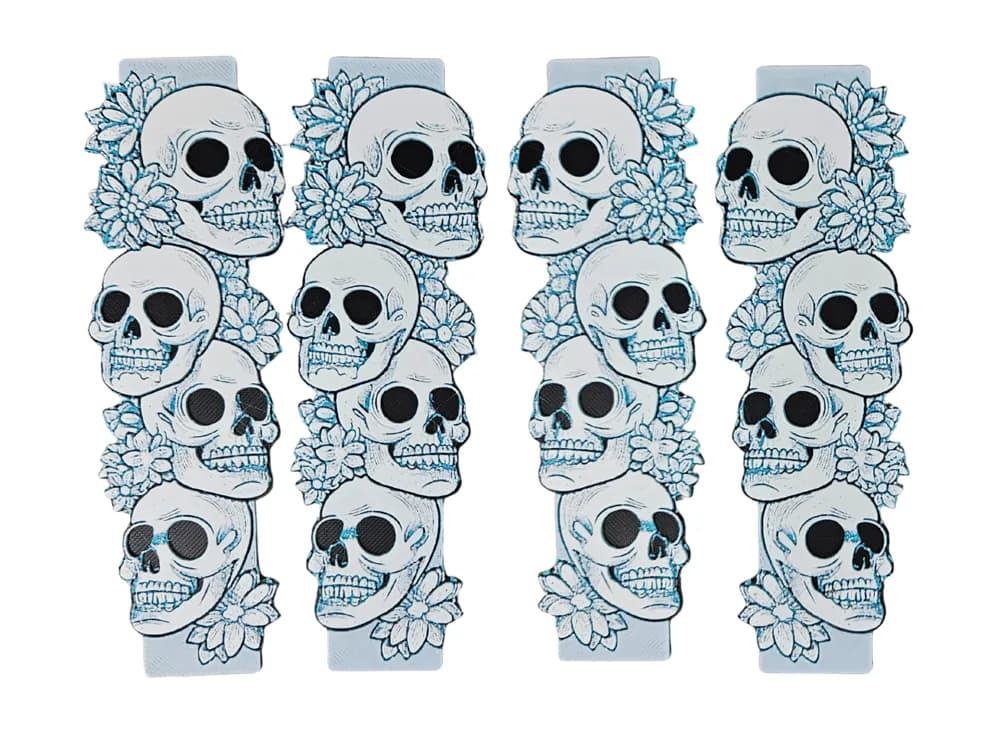Skulls and Flowers Bookmarks by BusyKikiBee HueForge model: Skulls and Flowers Bookmarks by BusyKikiBee